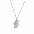 A silver necklace featuring a pendant shaped like the map of Ireland, shown against a plain white background.