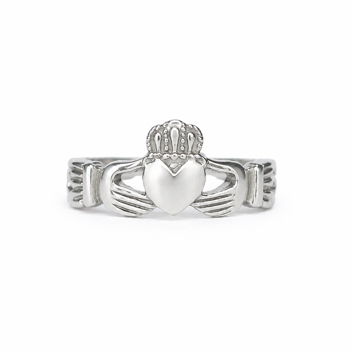 A silver Claddagh ring featuring a heart held by two hands under a crown, shown on a plain white background.