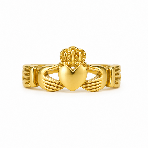 A gold Claddagh ring featuring a heart held by two hands under a crown, shown on a plain white background.
